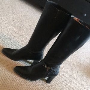 Never worn boots. Collecting dust in my closet